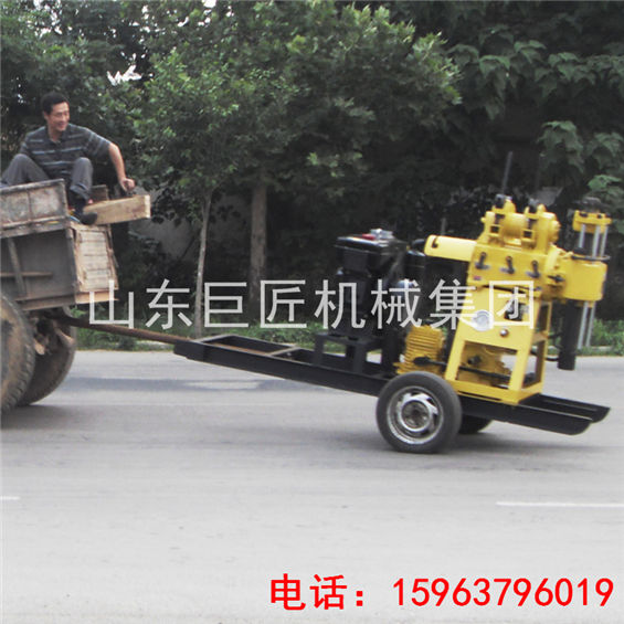 湖南全液壓拖掛勘探鉆機_華夏巨匠200米輪式液壓地質(zhì)鉆機